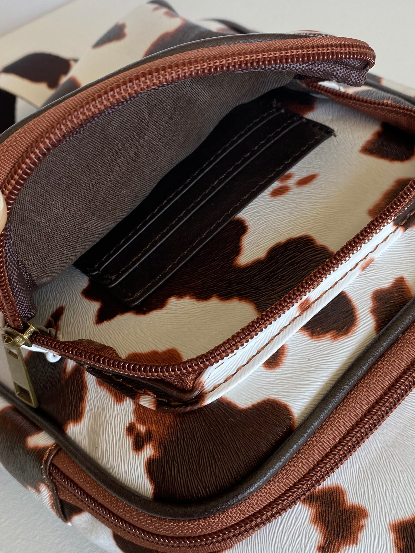 Brown Cow Textured Microfiber Leather Backpack Purse
