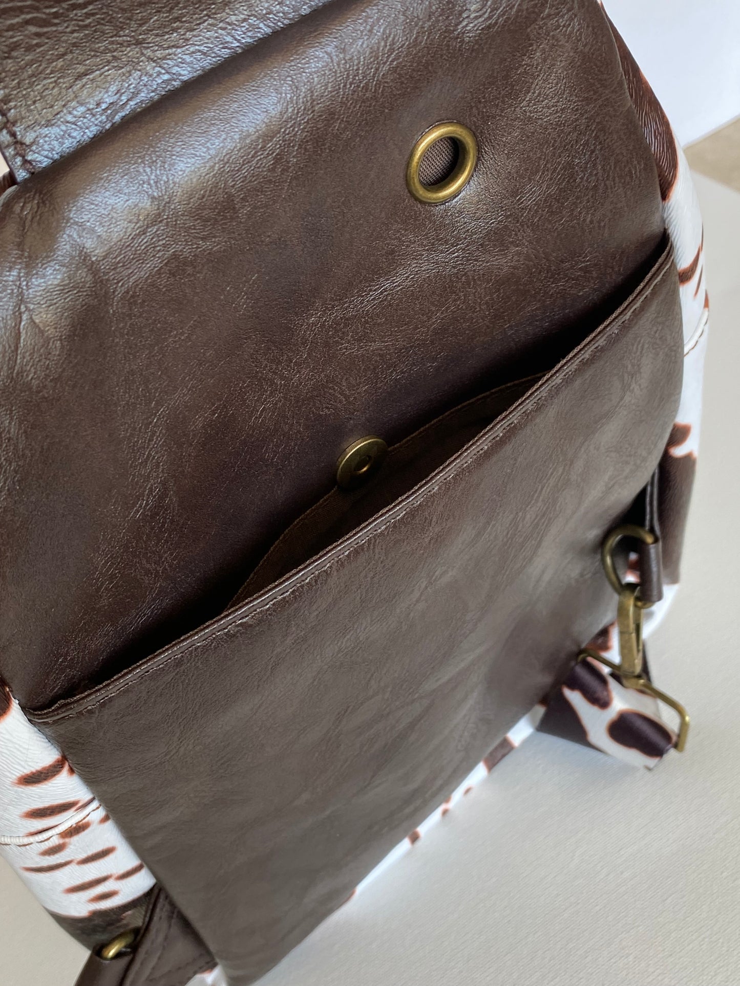 Brown Cow Textured Microfiber Leather Backpack Purse