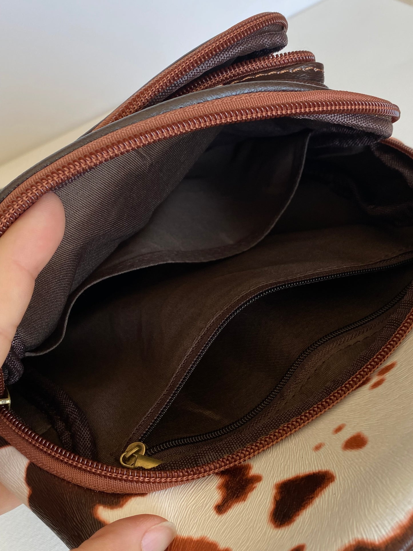 Brown Cow Textured Microfiber Leather Backpack Purse