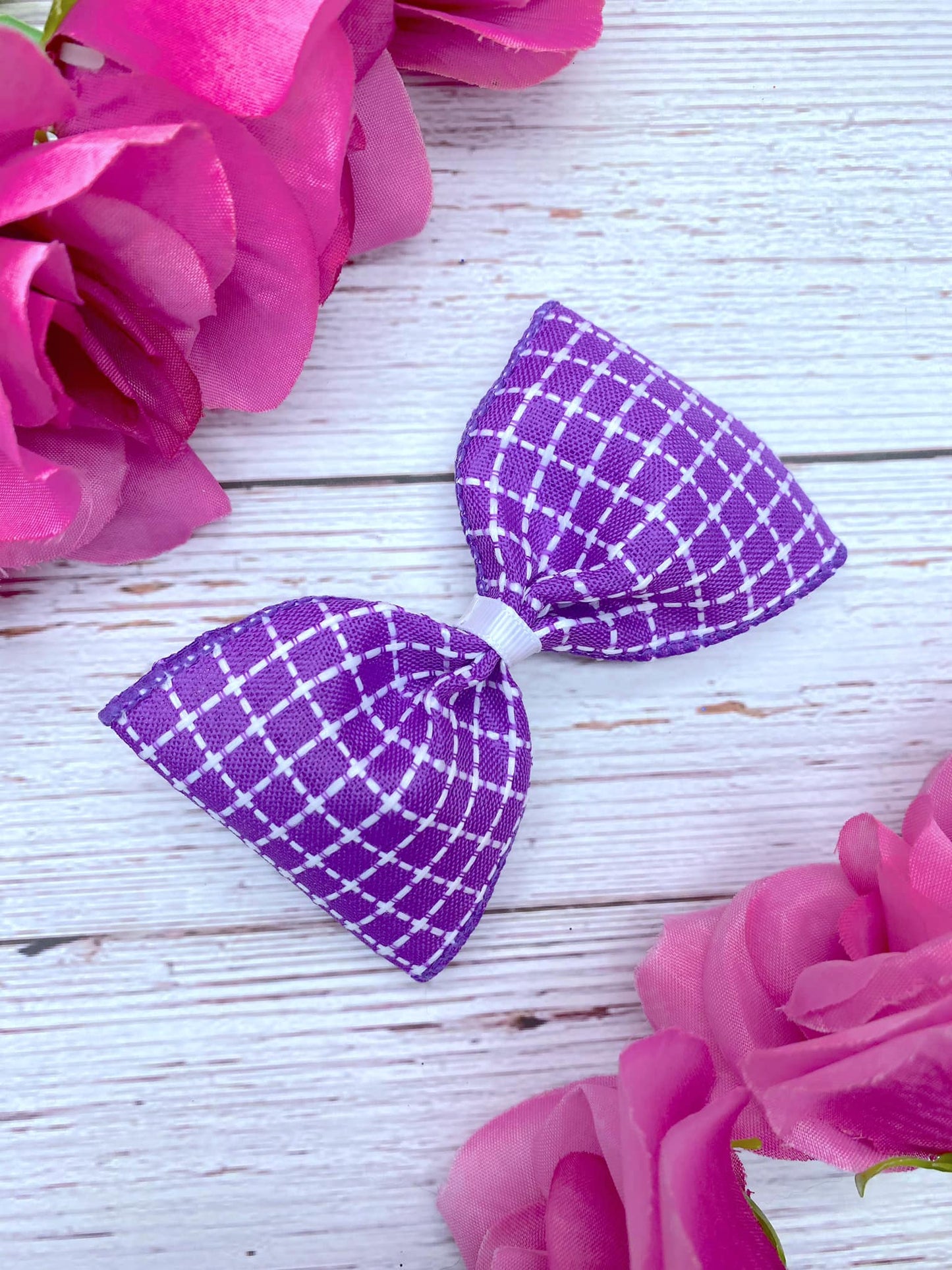 Purple and White Stitching